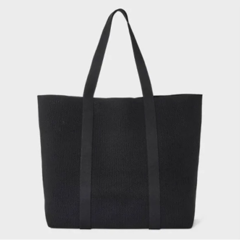 a new day Black Tote Bag